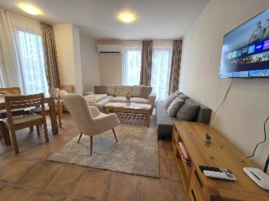 Обзаведен двустаен апартамент за продажба в жилищна сграда Murphys Lodge, Банско